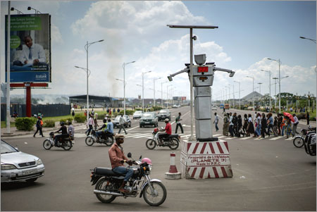 A Giant Robot Combats Traffic and Corruption in Kinshasa, Democratic Republic of Congo